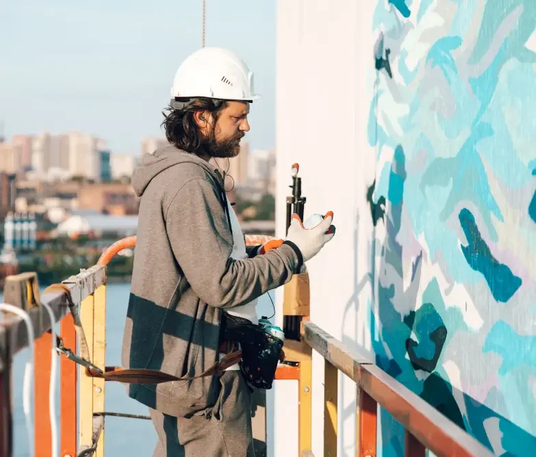 Commercial painters Perth sanding and preparing walls before painting